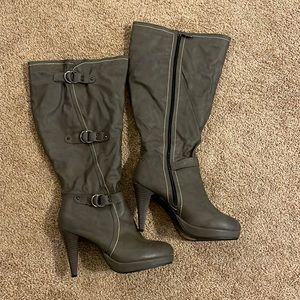 Brand new heeled boots, knee high. Women’s size 10.